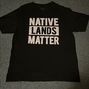 NATIVE LANDS MATTER-Black Graphic T-Shirt with Bold Statement